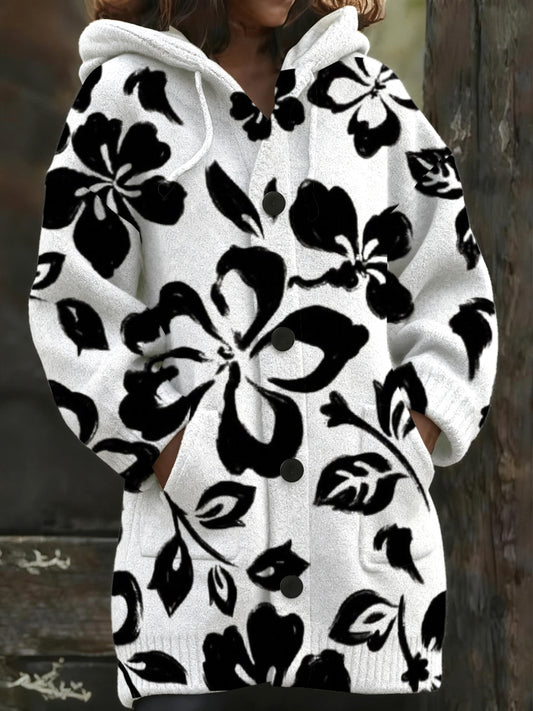 Manteau long à capuchon à imprimé floral noir et blanc audacieux pour femme